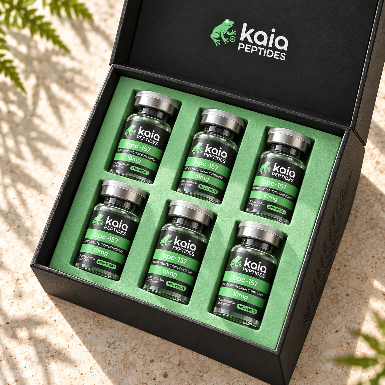 Overhead concept detail of six labelled Kaia vials in a fitted mint insert